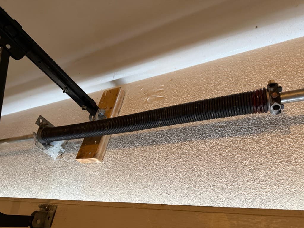 New garage door torsion spring after repair garage door comparison in Portland, OR